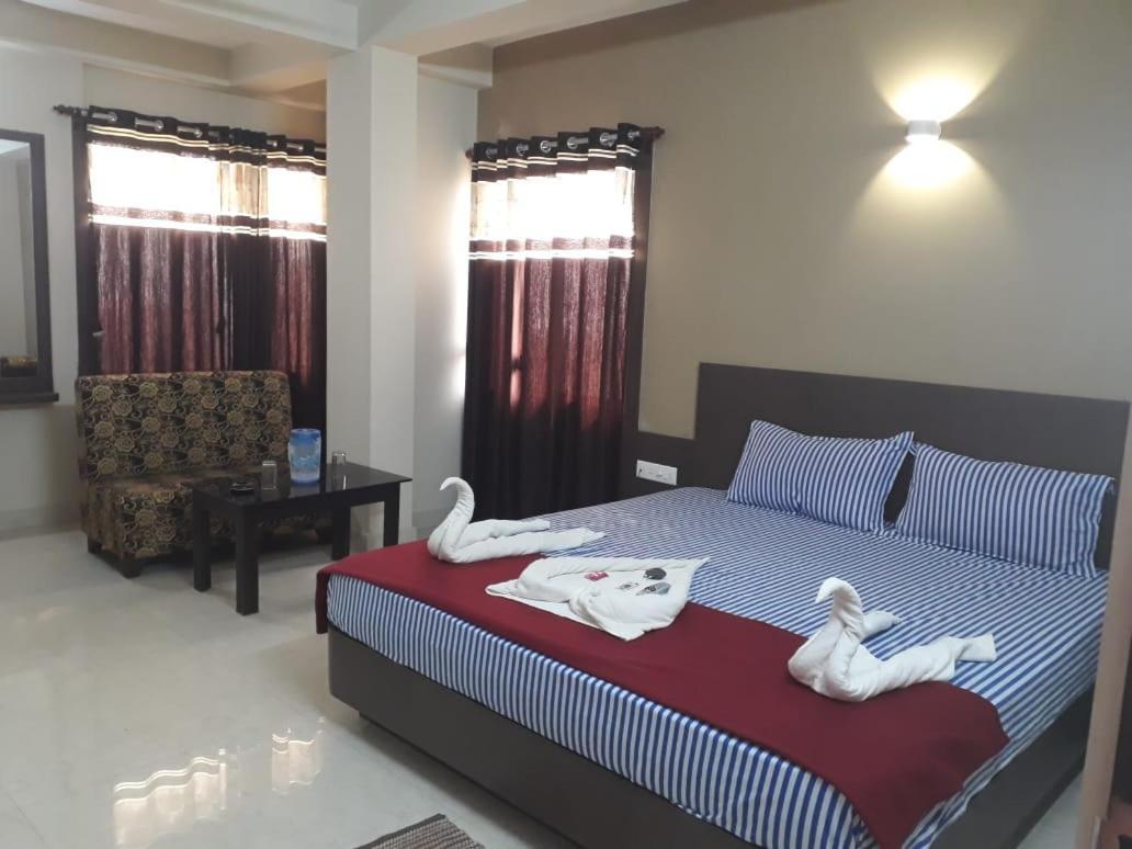 Goroomgo Hotel Uk Palace Puri Bagian luar foto